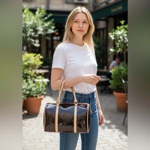 Original Lov cat by Paris handbags, clean, minor discoloration.